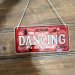 Plateskilt med «Dancing»-henger