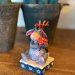 Disney-figuren Ior med blomst