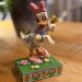 Disney-figur: Kajsa Anka og sommerfugler