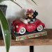 Disney-figurene Musse og Mimmi kjører bil