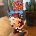 Disney-figuren Musse bærer på julegaver