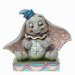Disney-figur av en sittende Dumbo