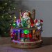 Juledekorasjon: Nisse med tog og musikk