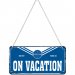 Metallskilt med henger «Pan Am – On Vacation»