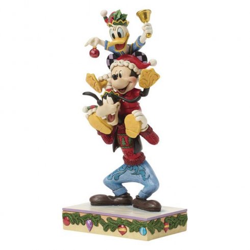 Disney-figurene Kalle og Langben pynter juletreet