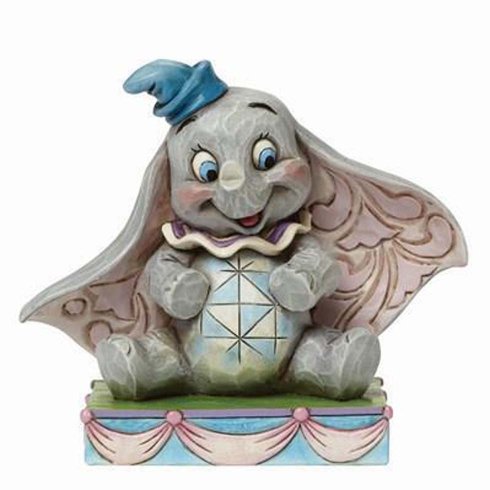 Disney-figur av en sittende Dumbo