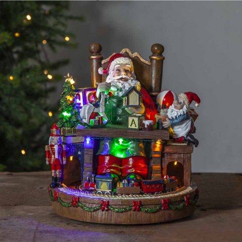 Juledekorasjon: Nisse med tog og musikk