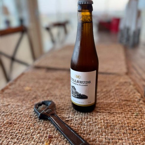 Flaskeåpner i jern, svart skiftenøkkel